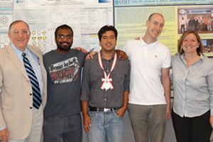 Celebrating the arrival of Akiyama Medal UOIT won at the 2012 ICONE Conference. From left: Dr. Igor Pioro, FESNS; undergraduate FESNS students Prabu Surendran and Sahil Gupta; Master of Applied Science student Donald McGillivray; and Dr. Liliana Trevani, Faculty of Science. Right: UOIT's Akiyama Medal from ICONE 2012.